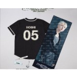 黒のvネックグラフィックトップ17の衣装